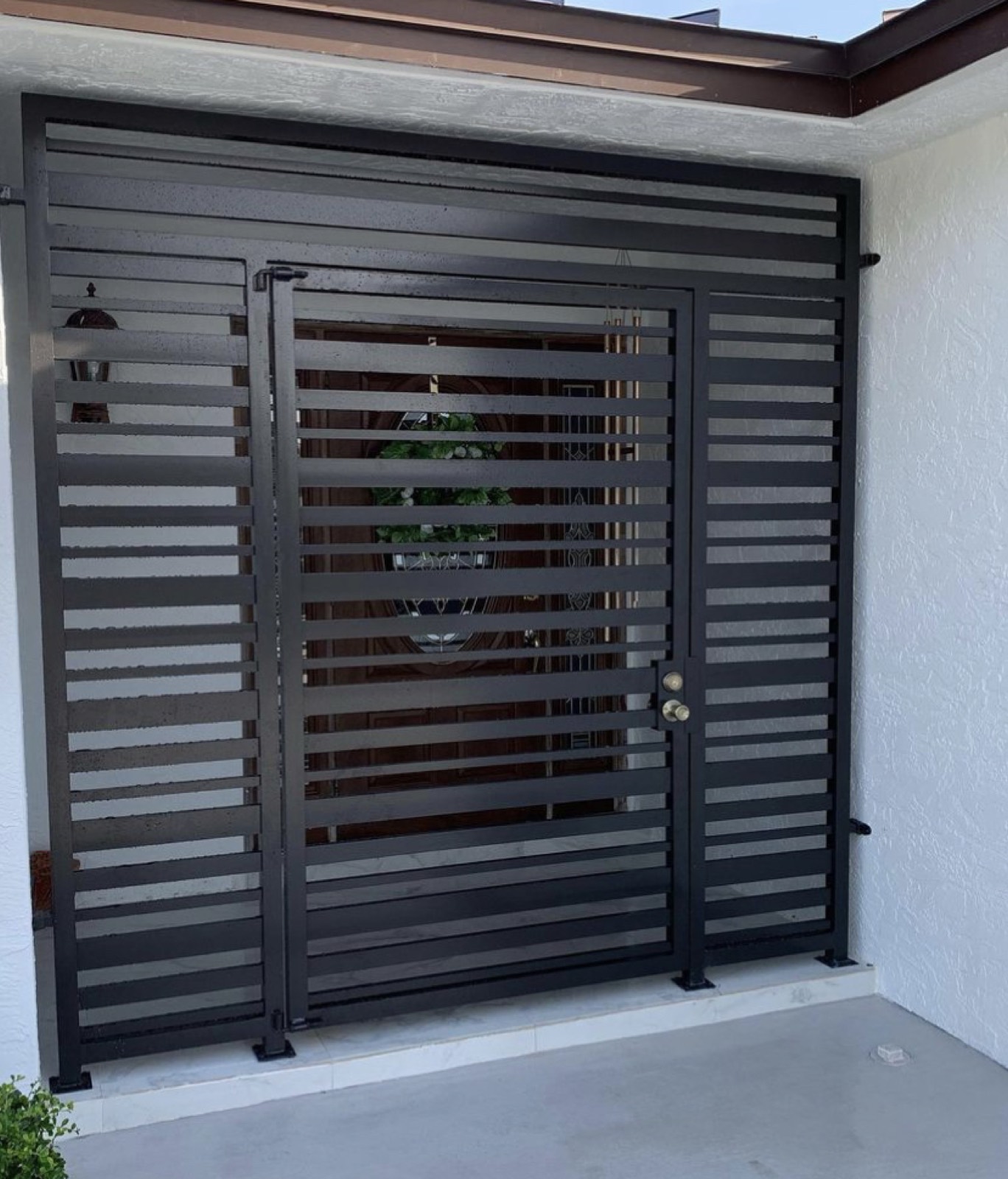 Dark aluminum entry gate